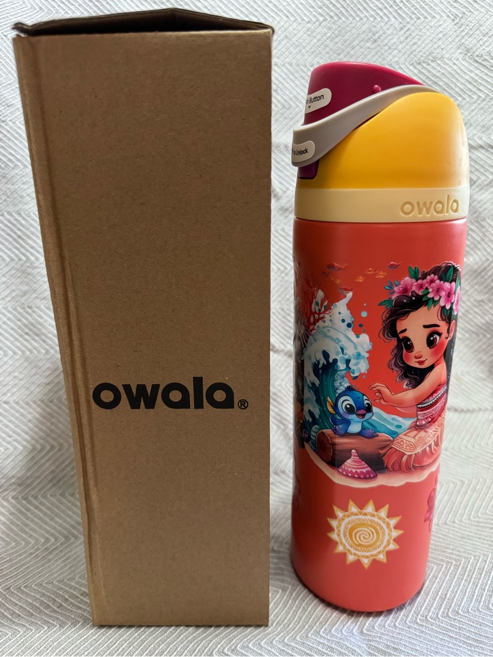 Owala Stainless Steel Water Bottle with Moana graphic design.